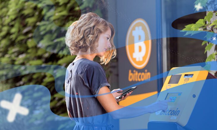 Woman with bitcoin atm